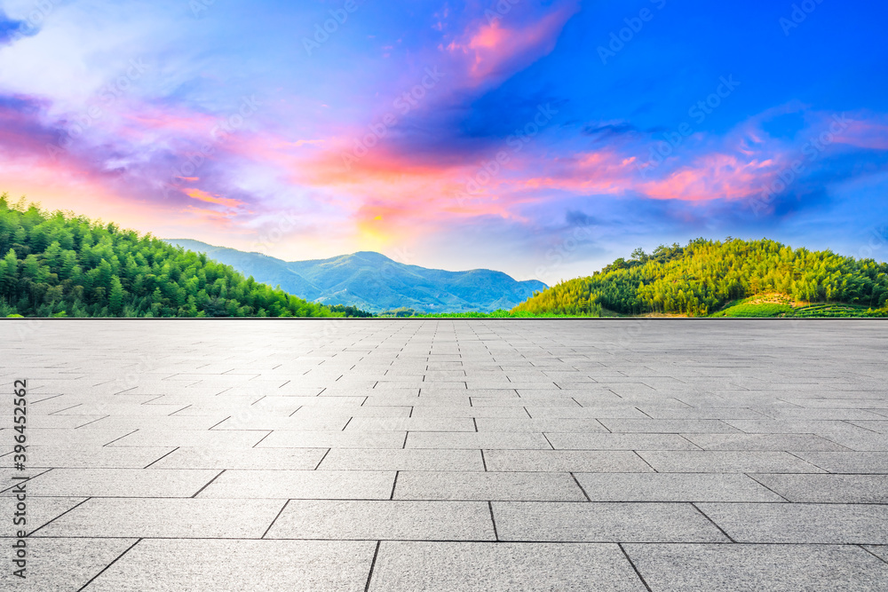 Empty square floor and green tea plantation with bamboo forest natural landscape.