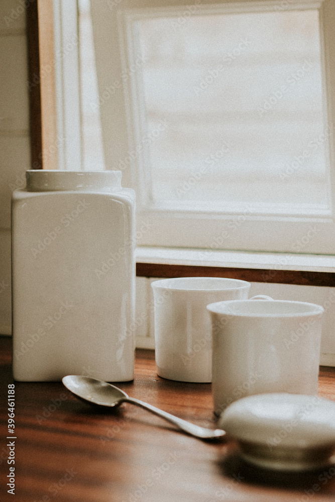 Coffee white porcelain jars on kitchen counter