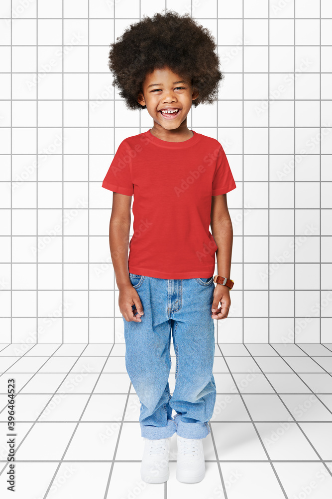 Black boy wearing t-shirt with pants in studio