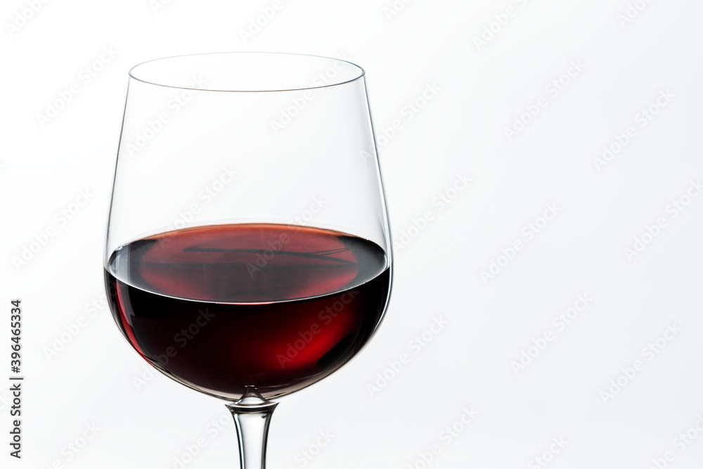 Wine glass with red wine closeup