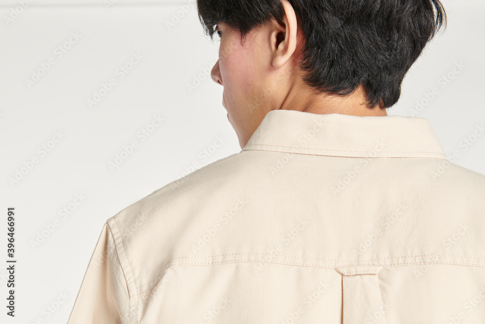 Man in a beige shirt mockup