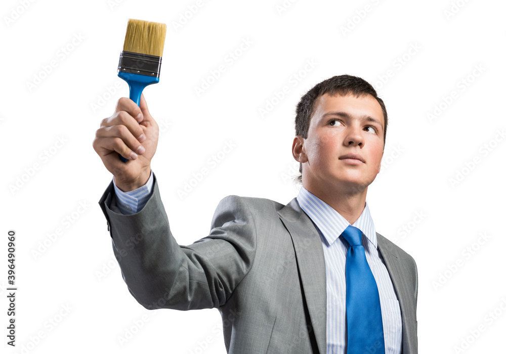 Creative businessman painter holding paintbrush