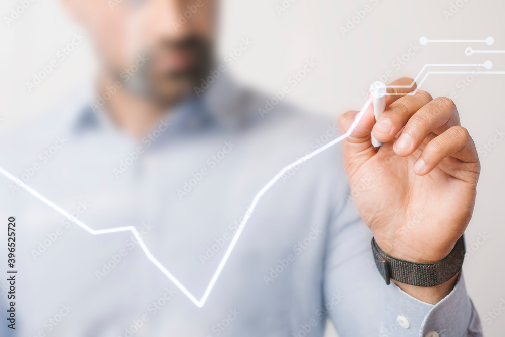 Man giving a business presentation using a futuristic digital pen