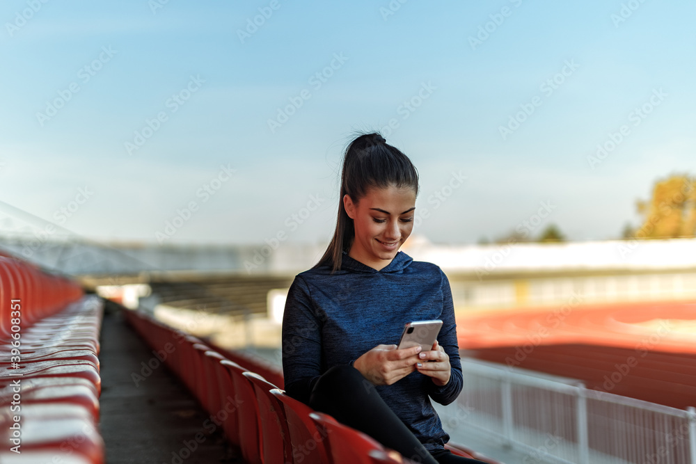 Girl chatting with someone over the phone.