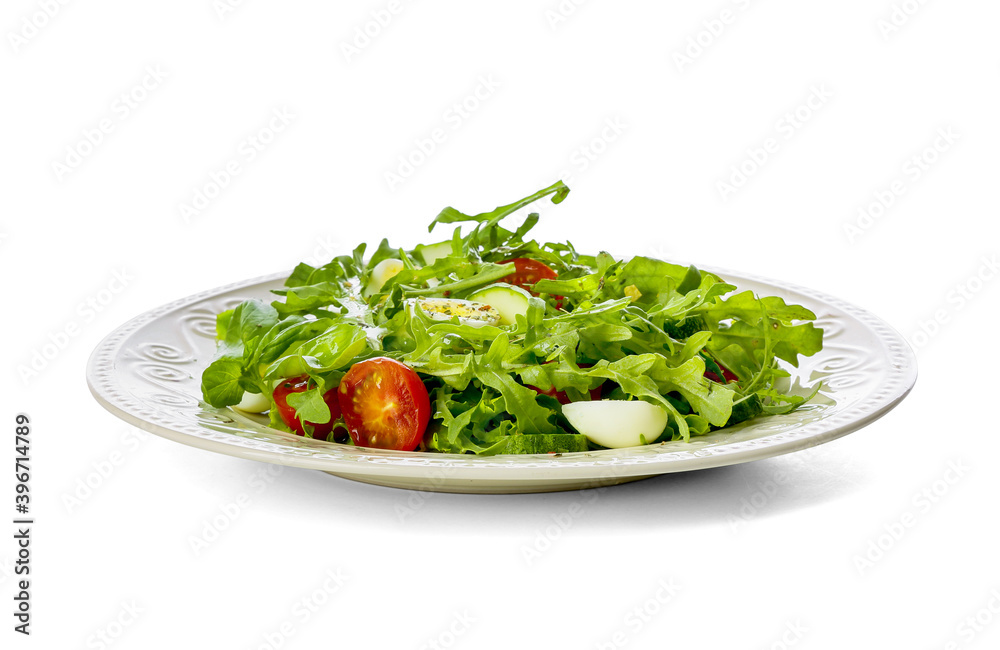 Plate with tasty arugula salad on white background