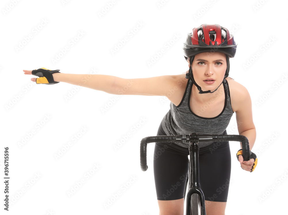 Female cyclist riding bicycle on white background