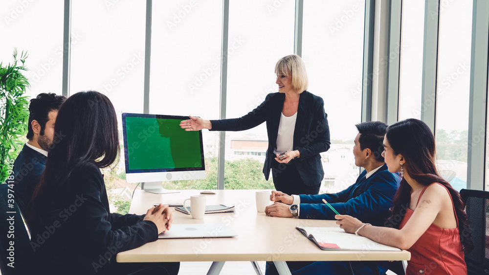 Business people in the conference room with green screen chroma key TV or computer on the office tab