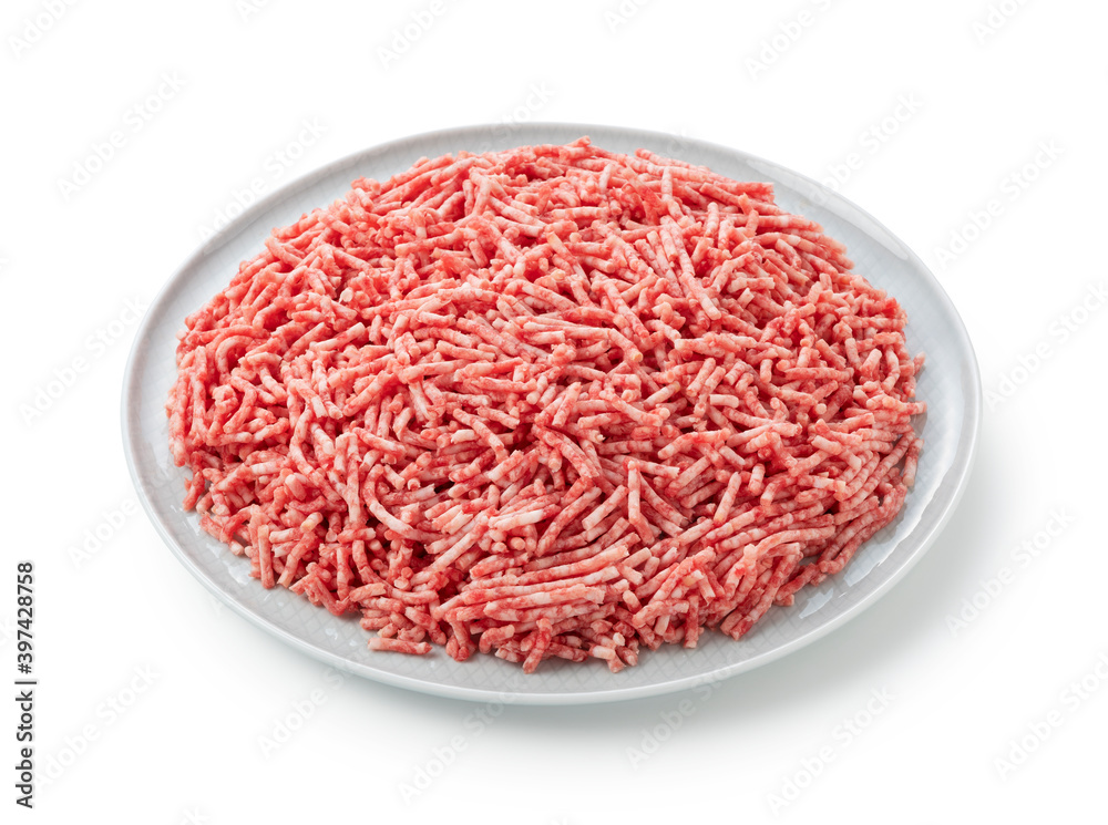 Minced meat served on a plate on a white background