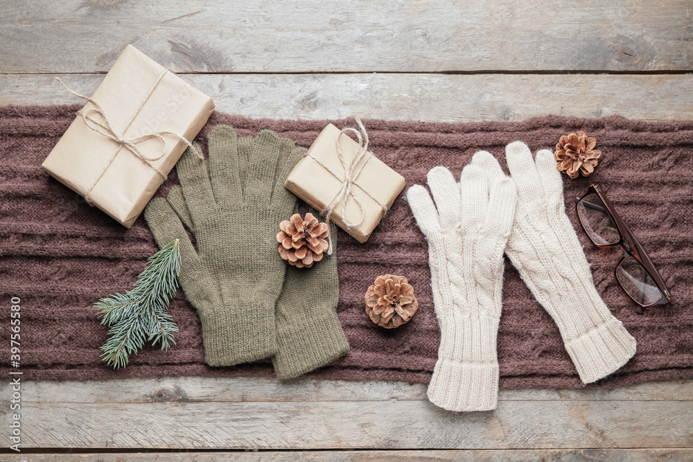 Christmas composition with stylish accessories on wooden background