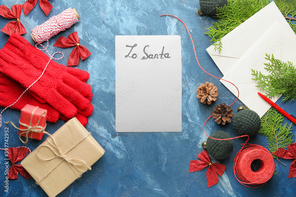 Blank letter to Santa and Christmas decor on color background