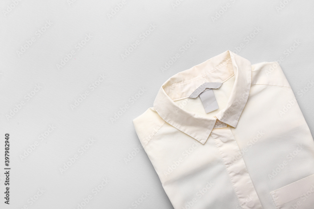 Stylish male shirt on light background