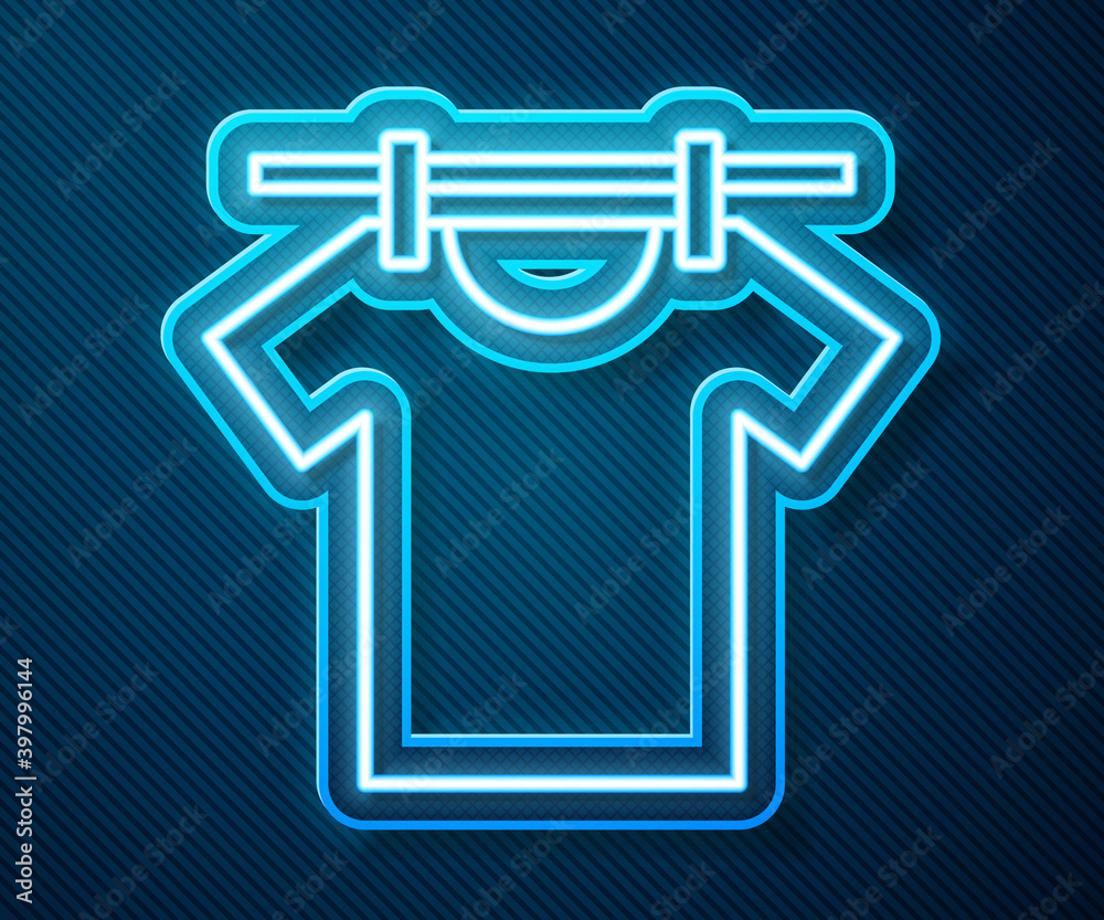 Glowing neon line Drying clothes icon isolated on blue background. Clean shirt. Wash clothes on a ro