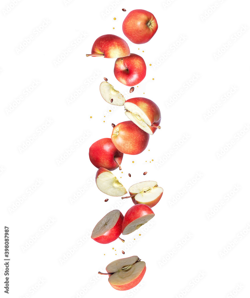 Chopped ripe apples are falling down, isolated on a white background