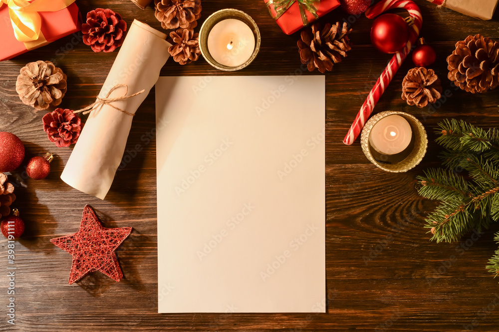 Blank paper for letter to Santa and Christmas decor on wooden background