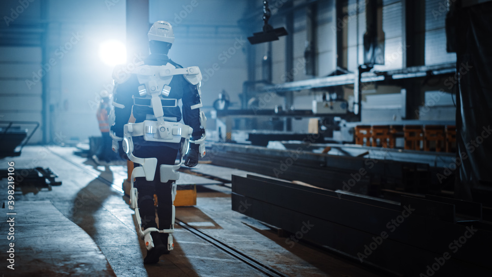 Black African American Engineer is Testing a Futuristic Bionic Exoskeleton and Proudly Wearing it in