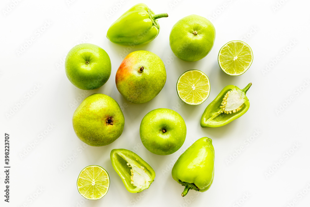 Background of raw green vegetables and herbs, top view