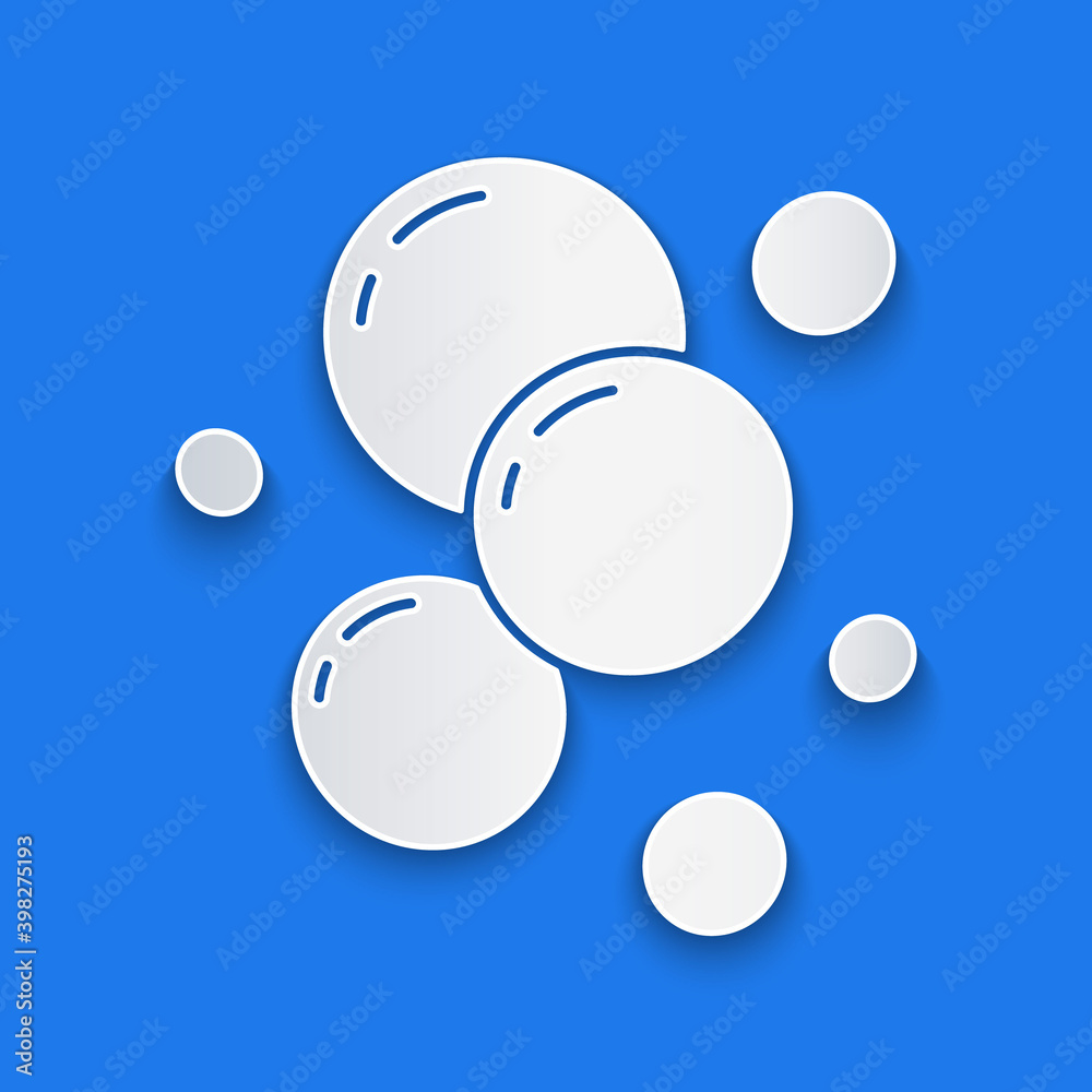 Paper cut Soap water bubbles icon isolated on blue background. Paper art style. Vector.