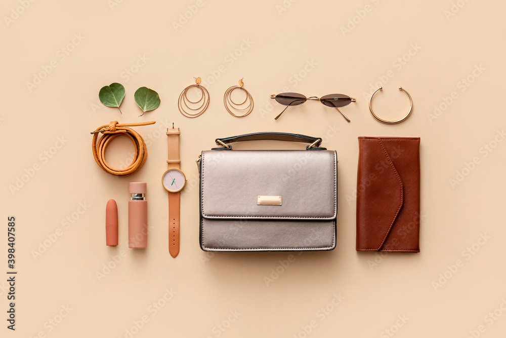 Composition with stylish bag and accessories on color background