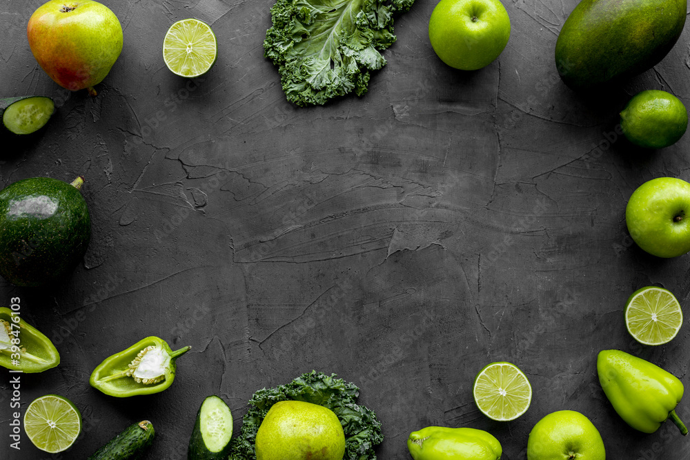 Frame of vegetarian food - green vegetables: cucumbers, broccoli, avocado