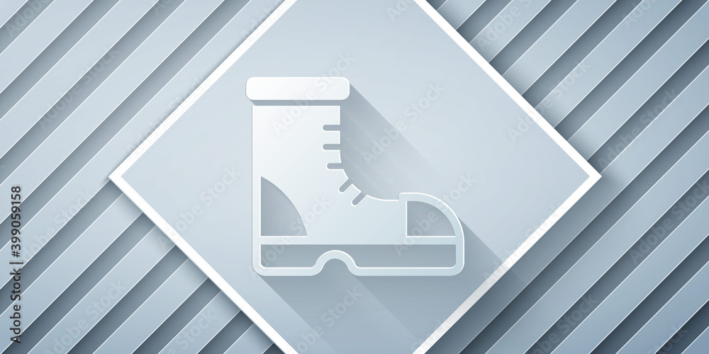 Paper cut Hunter boots icon isolated on grey background. Paper art style. Vector.