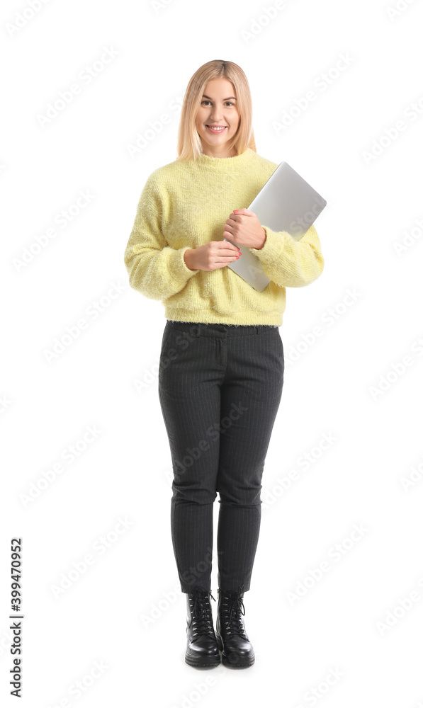 Beautiful young woman with laptop on white background