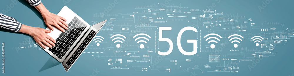 5G network with person using a laptop computer