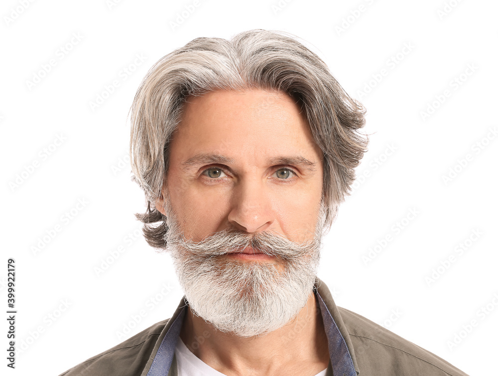 Portrait of mature man with grey hair on white background