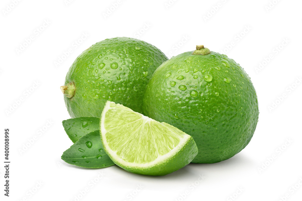 Fresh lime with sliced and water droplets isolated on white background.