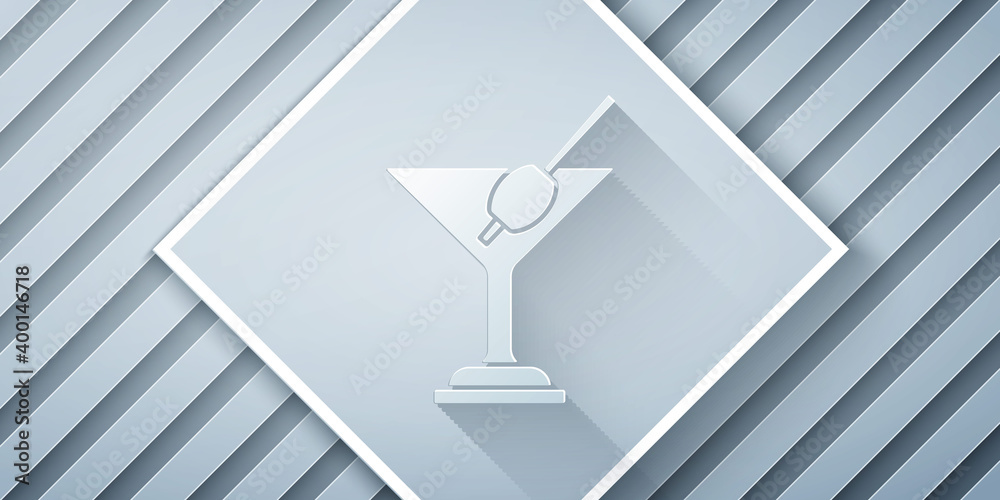 Paper cut Martini glass icon isolated on grey background. Cocktail icon. Wine glass icon. Paper art 