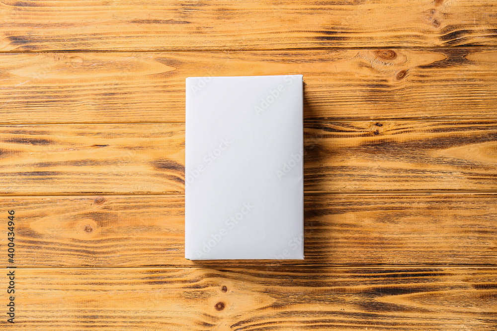 Blank book on wooden background