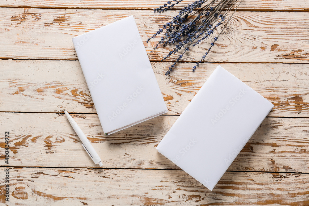 Blank books on wooden table