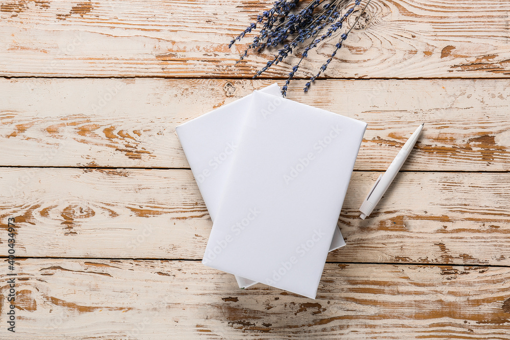 Blank books on wooden table