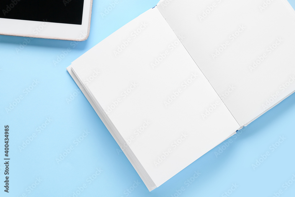 Blank book on color background