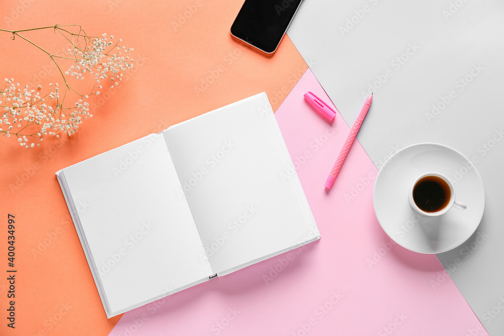 Composition with blank book on color background