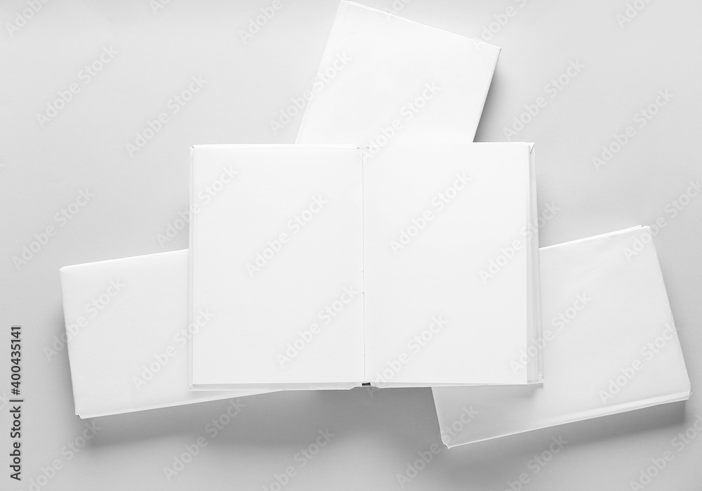 Blank books on light background