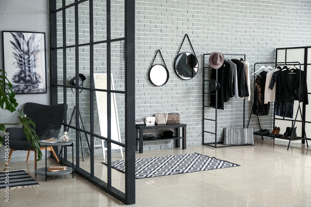 Stylish interior of modern wardrobe