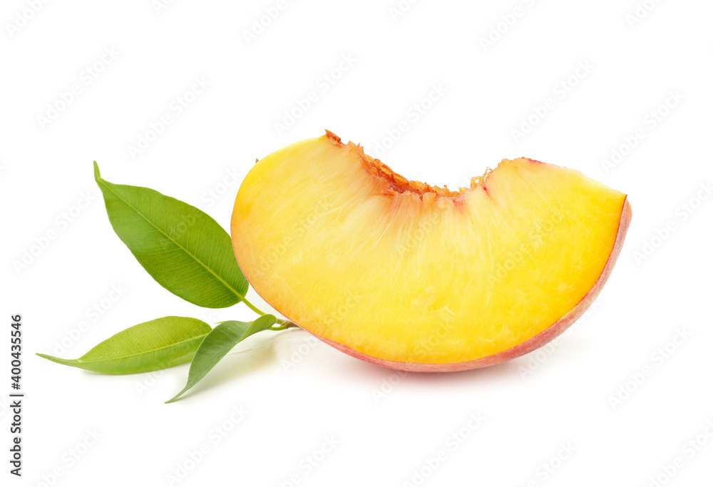 Piece of ripe peach on white background