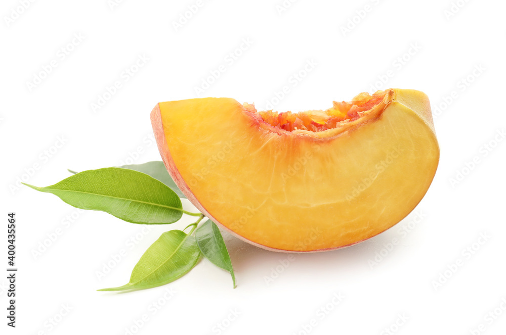 Piece of ripe peach on white background