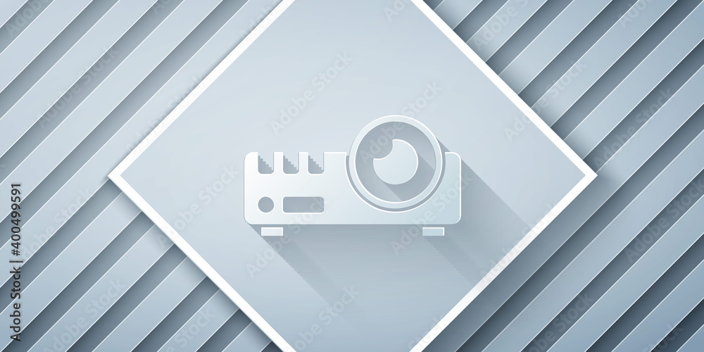 Paper cut Presentation, movie, film, media projector icon isolated on grey background. Paper art sty