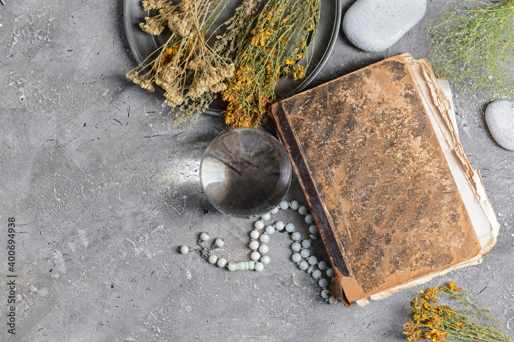 Accessories of fortune teller on grey background