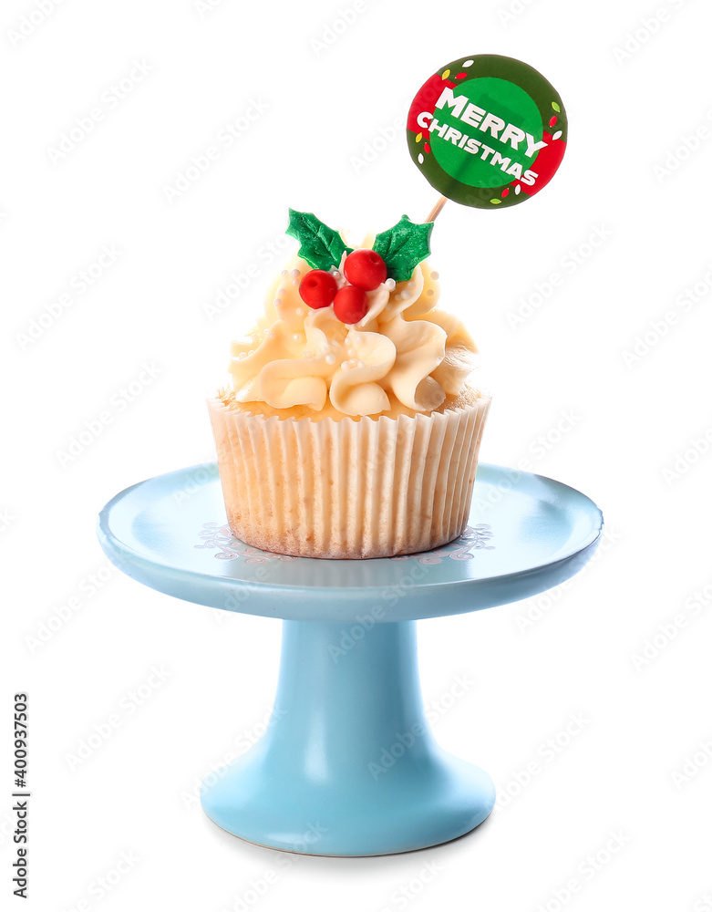 Dessert stand with tasty Christmas cupcake on white background