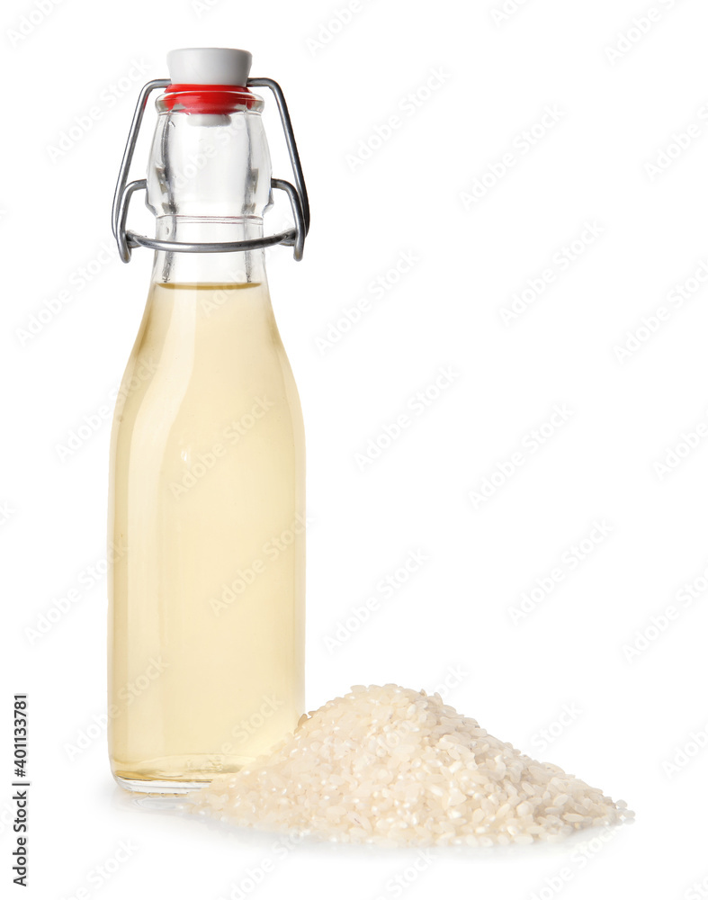 Bottle of rice vinegar on white background