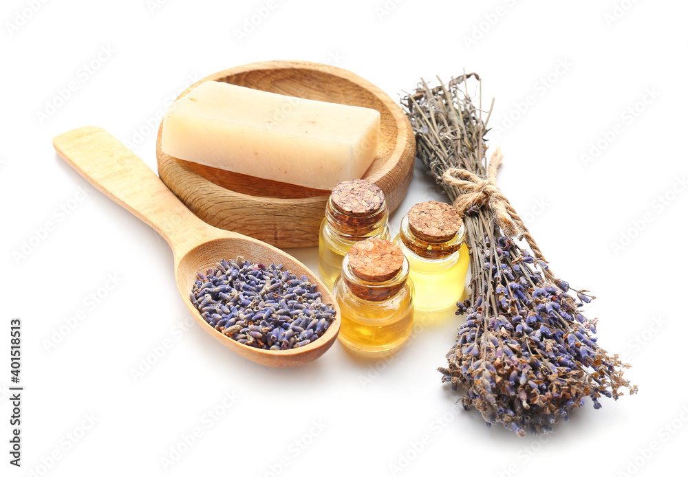 Composition with lavender bouquet and bath products on white background