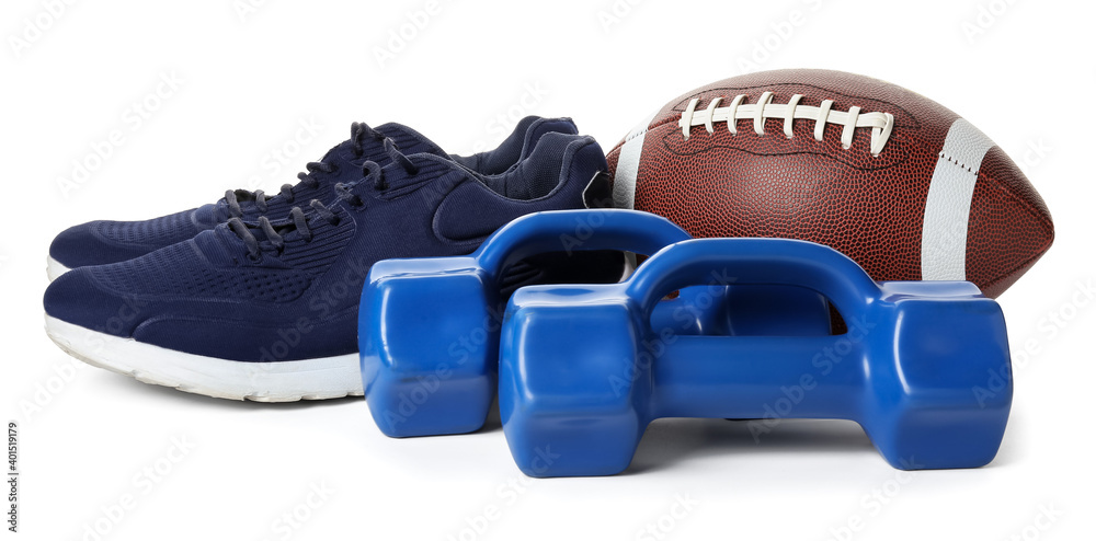 Stylish male shoes, dumbbells and rugby ball on white background