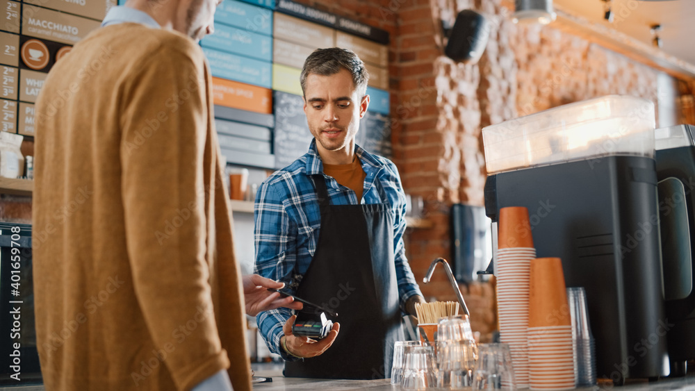 Tall Caucasian Customer Pays for Coffee and Pastry with Contactless NFC Payment Technology on Smartp