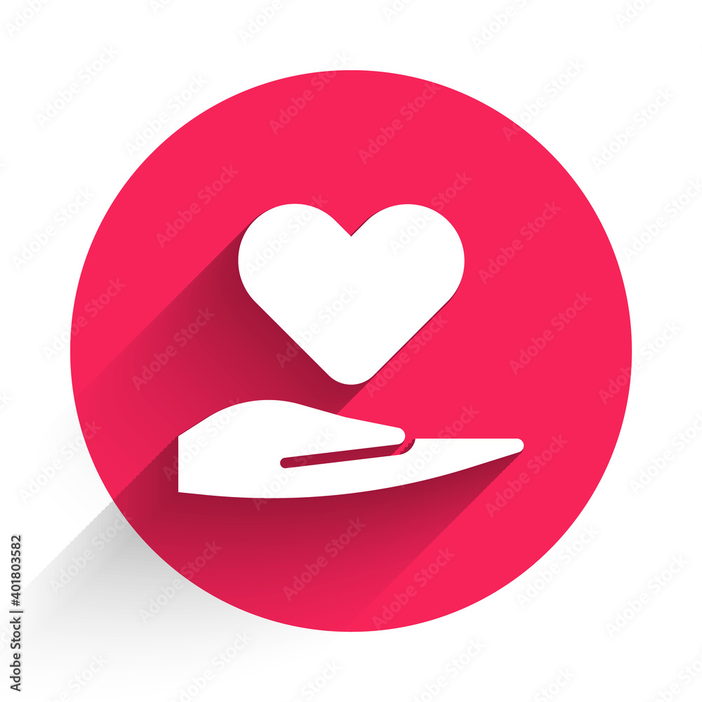 White Heart on hand icon isolated with long shadow. Hand giving love symbol. Valentines day symbol. 