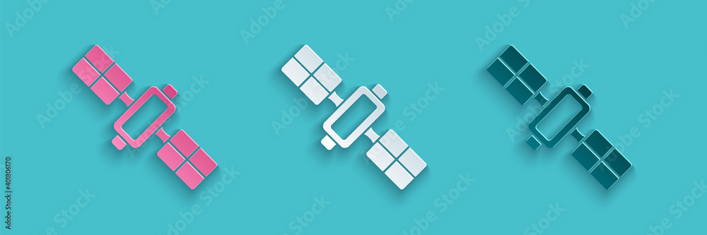 Paper cut Satellite icon isolated on blue background. Paper art style. Vector.