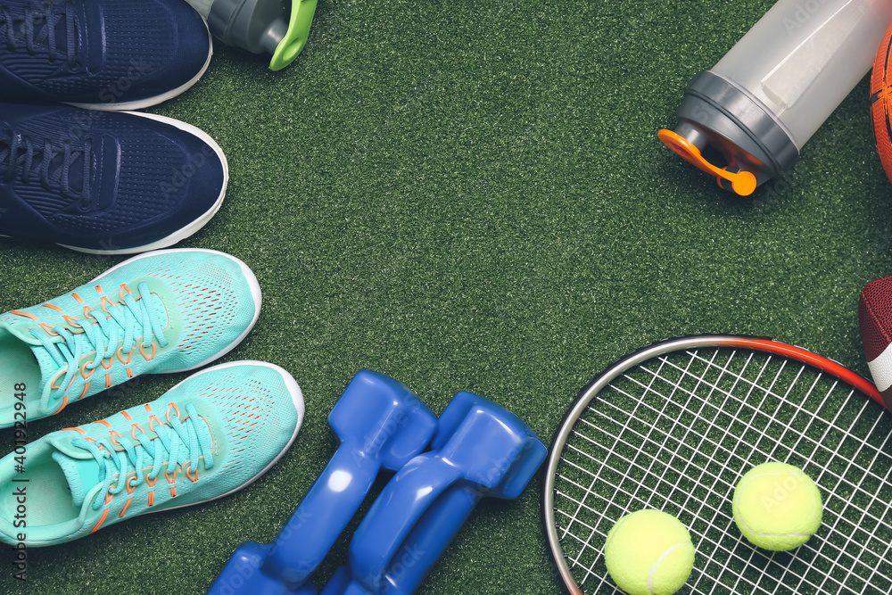 Set of sport equipment on color background