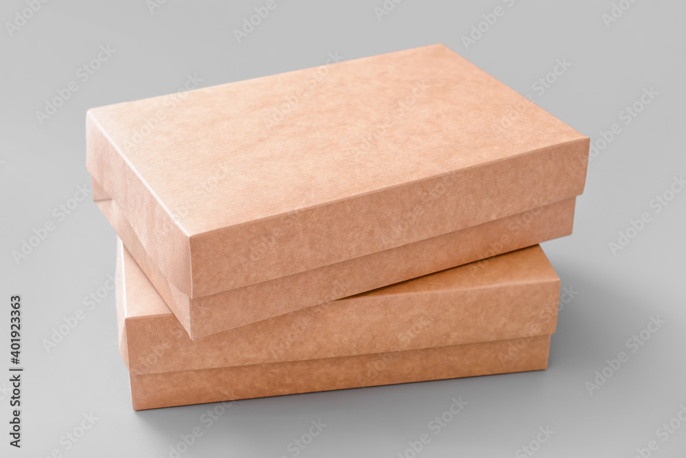 Blank cardboard boxes on light background