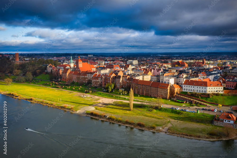 Grudziadz city with amazing granaries over the Vistula River in sunny day. Poland